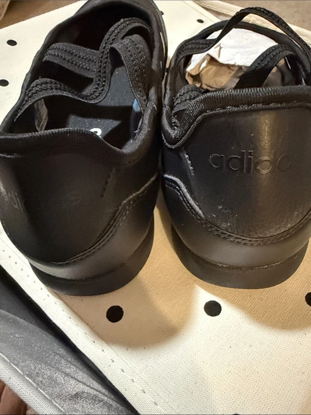 adidas Women's/youth Black Slip-On Athletic Flats with Elastic Cross Straps.